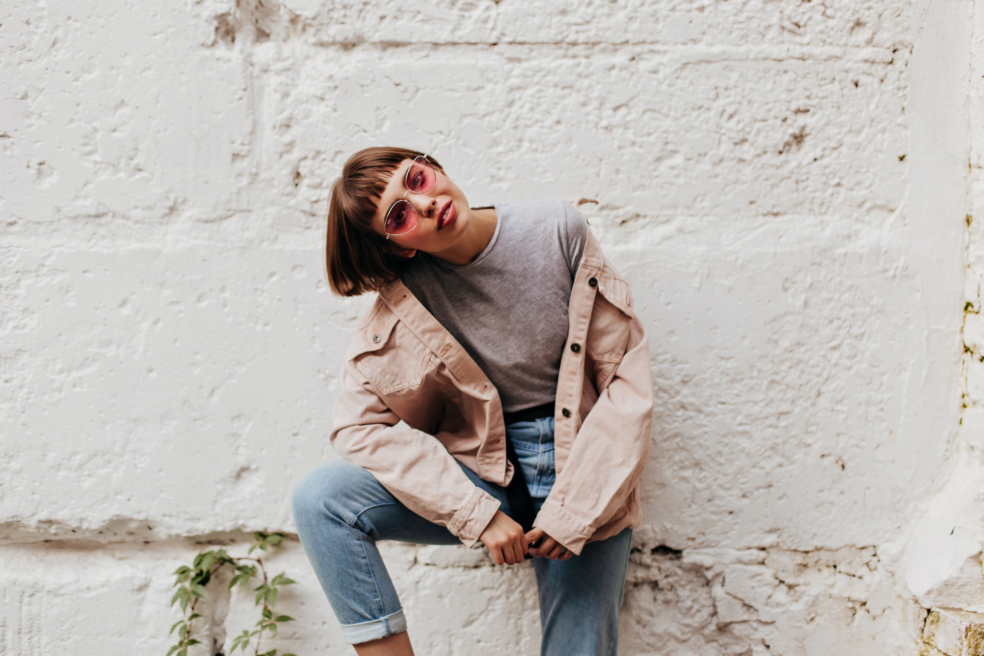 trendy-lady-with-pink-sunglasses-posing-outside-short-haired-girl-in-beige-jacket-jeans-and-t-shi.jpg